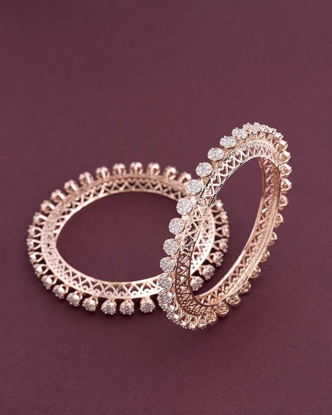 Zircons Embellished Brass Bangles Voylla Fashions Voylla jewellery does not only have gold and other precious jewellery in stylish designs but even artificial jewellery. voylla