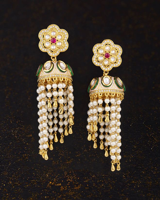 Kundan Stanza Faux Pearl Tassels Earrings Voylla Fashions Adorned with faux kundan gems. voylla